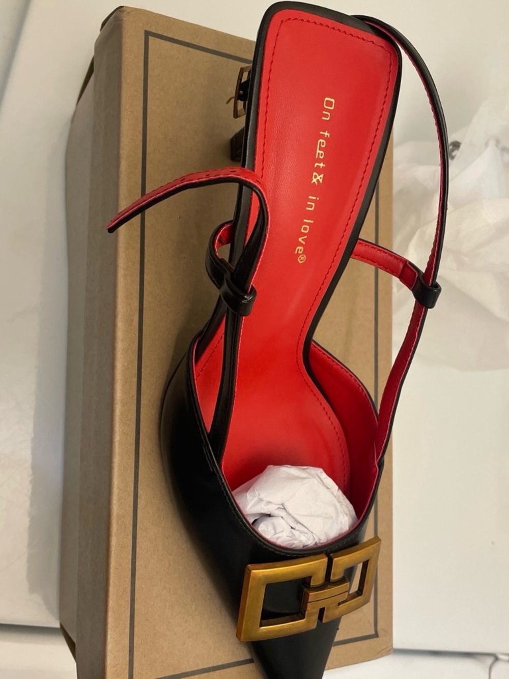 Black Pointed Slingback Pump with Red Insole and Gold Buckle